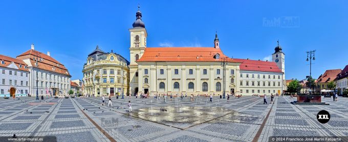 OF4699405. City Hall Palace and "Holy Trinity" Roman Catholic Church in Sibiu (Romania)